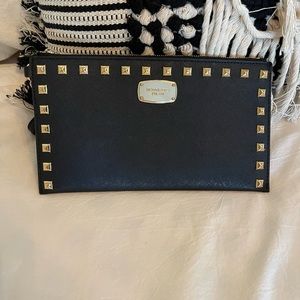 Micheal Kors black clutch with gold studs